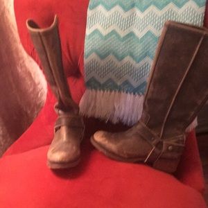 Brown riding boots from rural haze.